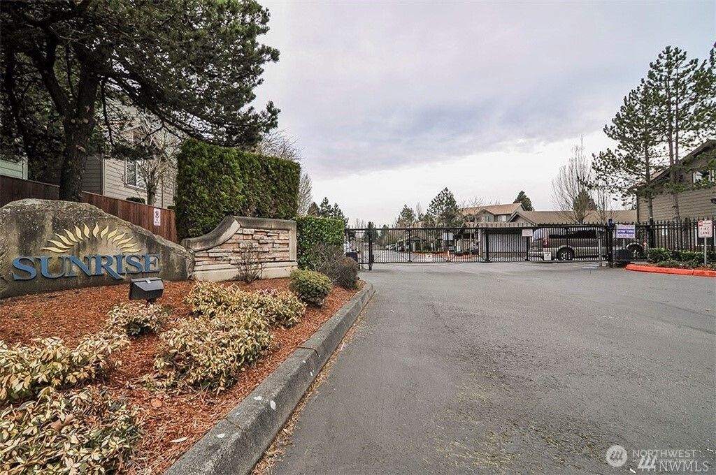 Photo of 10825 SE 200th Street #H201, Kent, WA 98031 (MLS # 2390437)