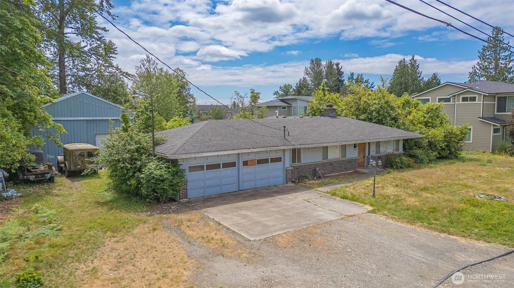 Photo of 5735 NE 8th Street, Renton, WA 98059 (MLS # 2406660)