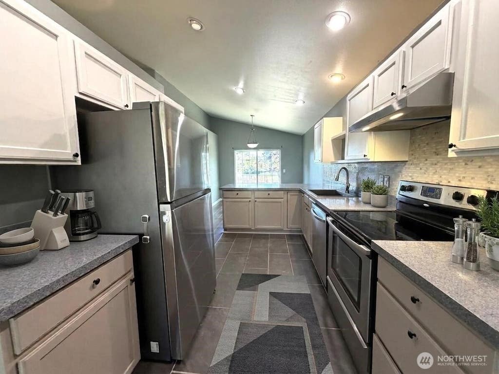 Photo of 98597 Cascadian Avenue SE, Yelm, WA 98597 (MLS # 2570733)