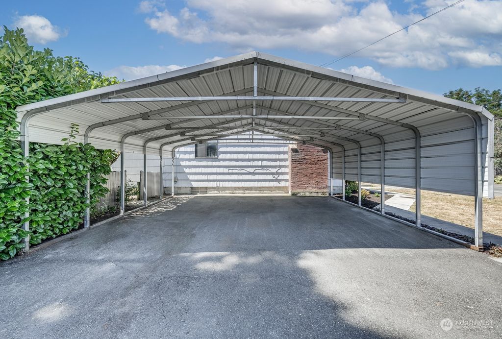 Photo of 1303 NW 100th Street, Seattle, WA 98177 (MLS # 2146934)