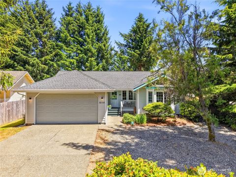 Photo of 654 Woodland Loop NE, Ocean Shores, WA 98569 (MLS # 2540873)