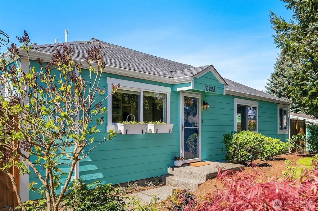 Photo of 10223 9th Avenue SW, Seattle, WA 98146 (MLS # 2359403)
