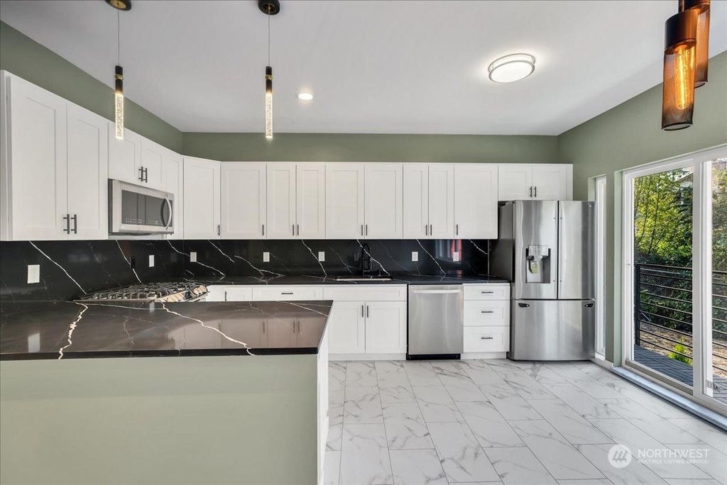 Photo of 3117 NE 133 Street #D, Seattle, WA 98125 (MLS # 2195787)