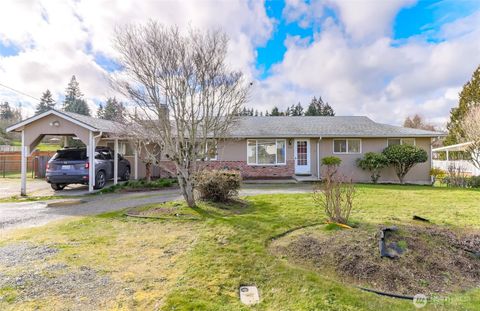 Photo of 8520 Woodland Avenue E, Puyallup, WA 98371 (MLS # 2490297)
