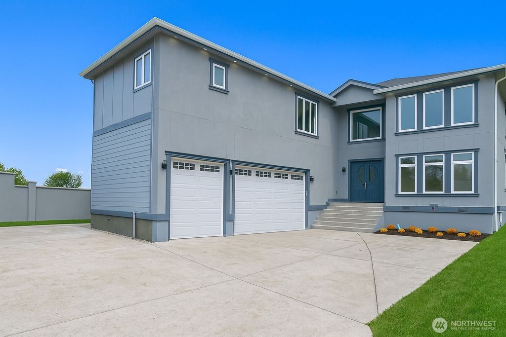 Photo of 4679 S 144th Street, Tukwila, WA 98168 (MLS # 2456942)