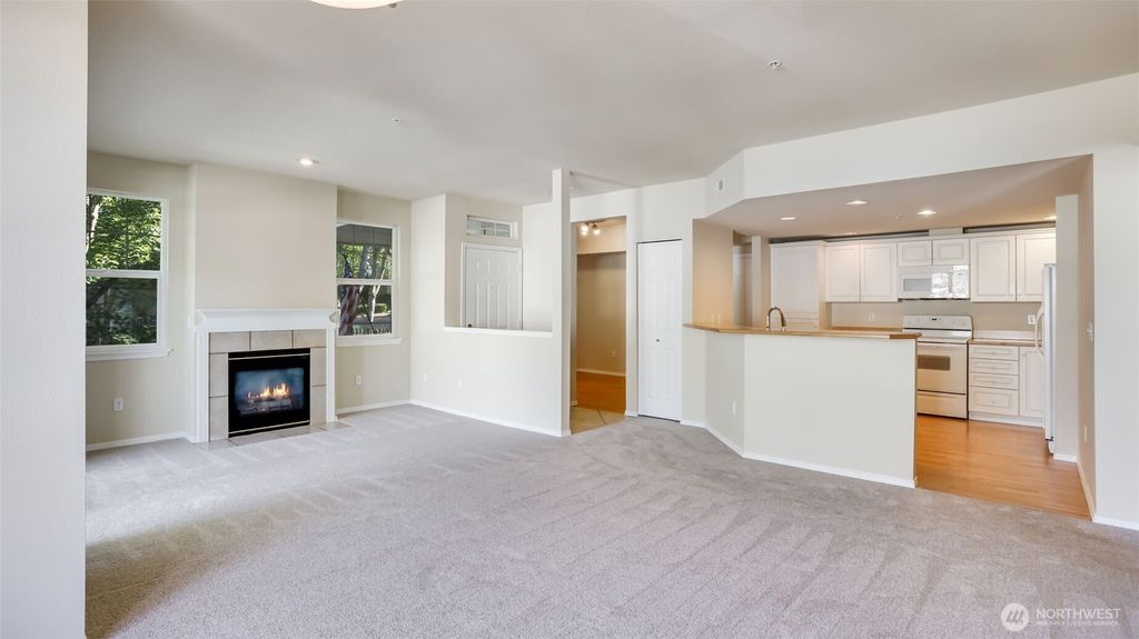 Photo of 425 S 46th Place #E, Renton, WA 98055 (MLS # 2411731)