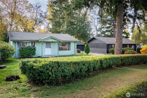 Photo of 615 SW 124th Street, Seattle, WA 98146 (MLS # 2451844)