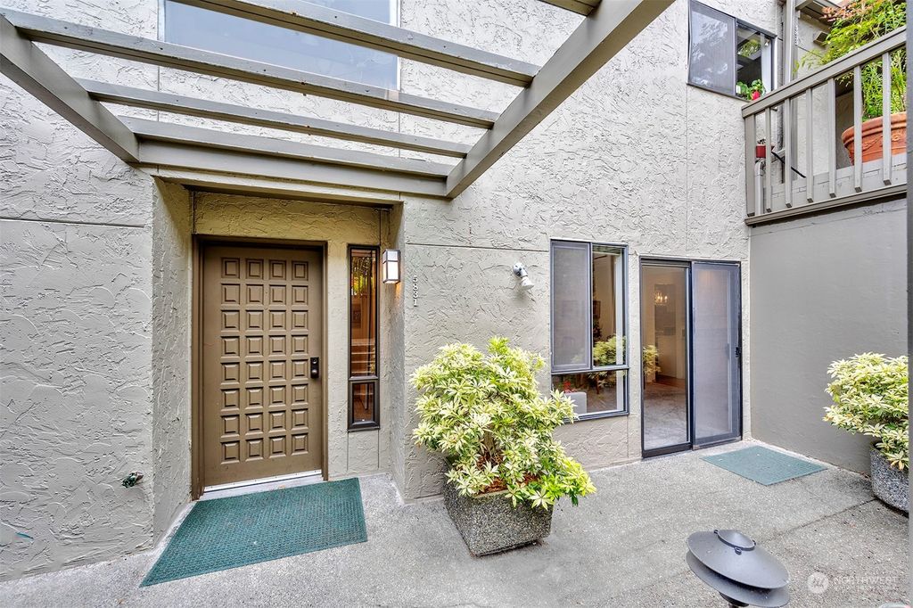 Photo of 5831 NE Parkpoint Drive #G-105, Seattle, WA 98115 (MLS # 2070096)