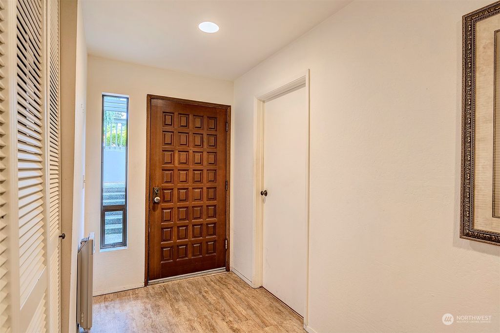 Photo of 5831 NE Parkpoint Drive #G-105, Seattle, WA 98115 (MLS # 2070096)