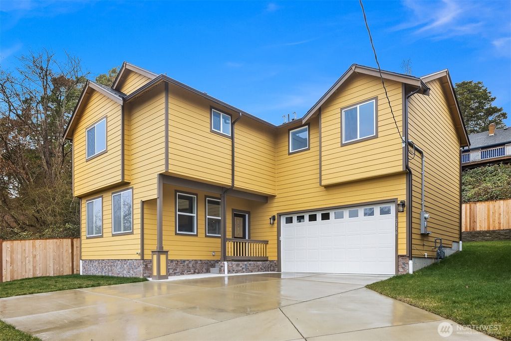 Photo of 2116 SW 103rd Place, Seattle, WA 98146 (MLS # 2335275)