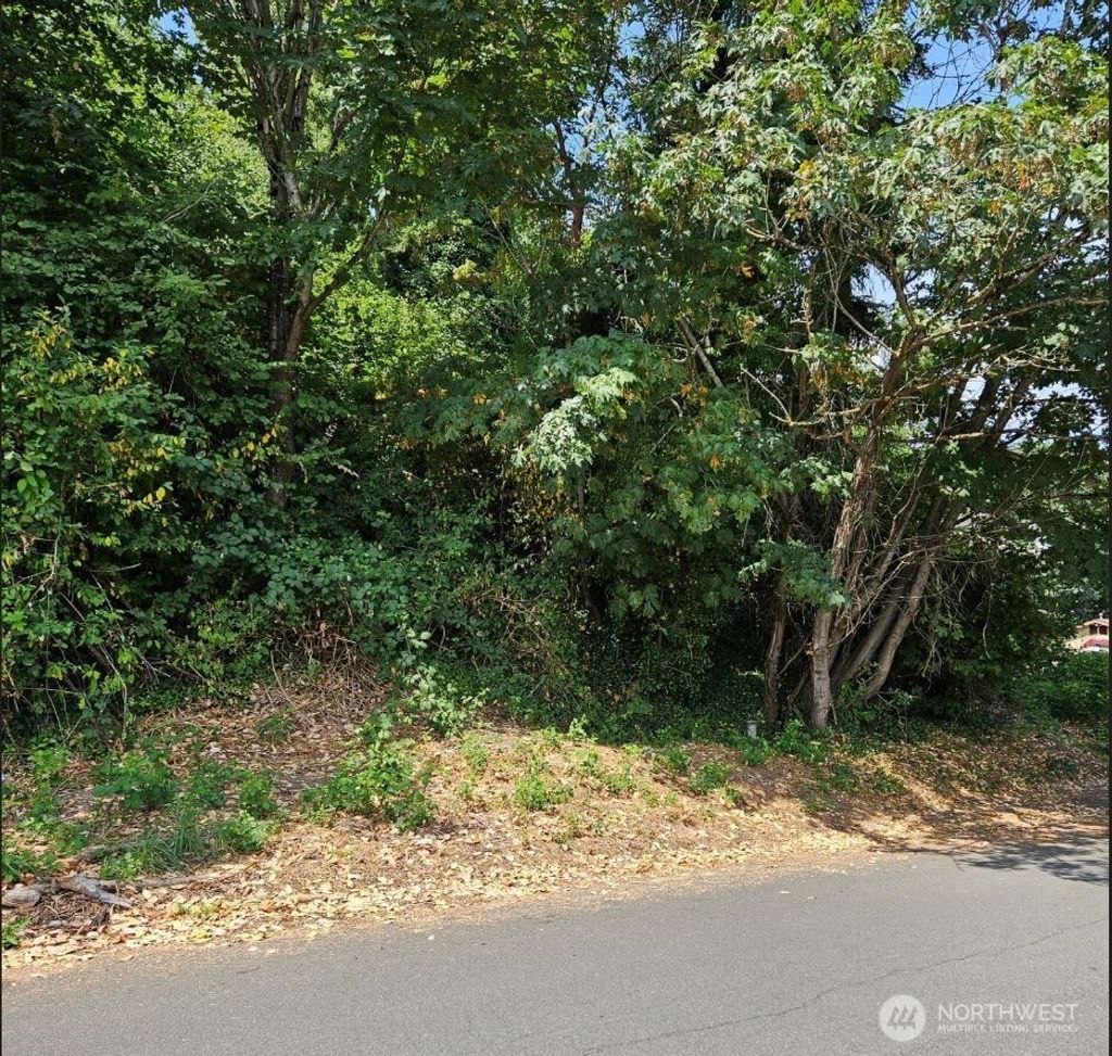 Photo of 8439 6th Avenue SW, Seattle, WA 98106 (MLS # 2388886)