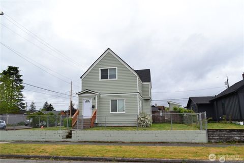 Photo of 3303 S 64th Street, Tacoma, WA 98409 (MLS # 2425184)