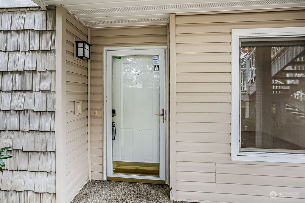 Photo of 11130 SE 208th Street #J101, Kent, WA 98031 (MLS # 2167084)