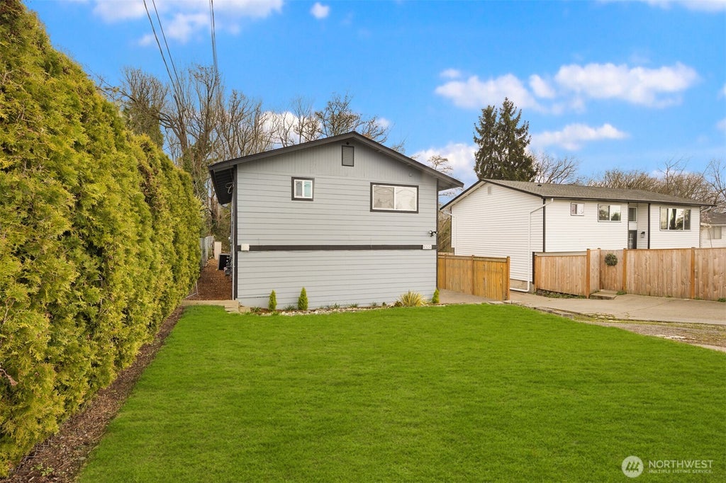 Photo of 5306 26th Avenue S, Seattle, WA 98118 (MLS # 2592365)