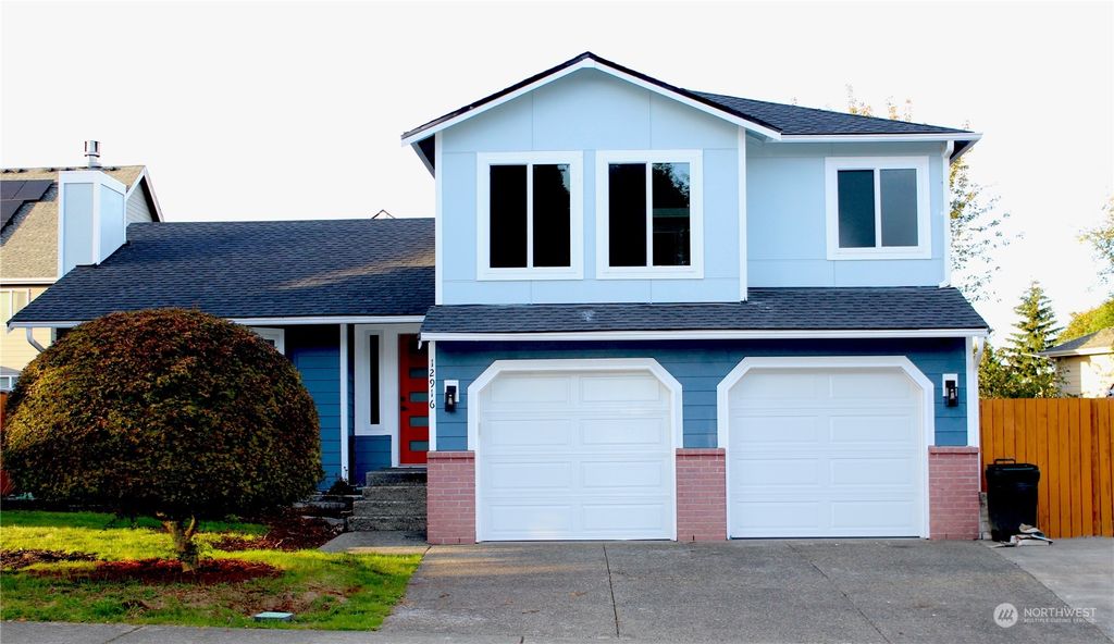 Photo of 12916 SE 217 Place, Kent, WA 98031 (MLS # 2301270)