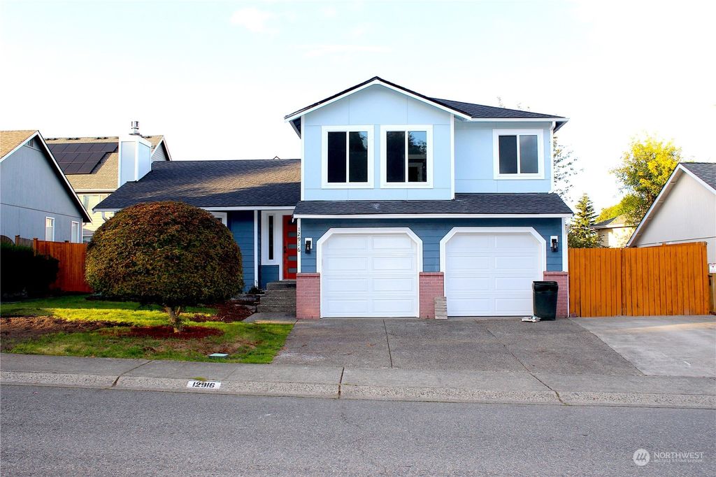 Photo of 12916 SE 217 Place, Kent, WA 98031 (MLS # 2301270)