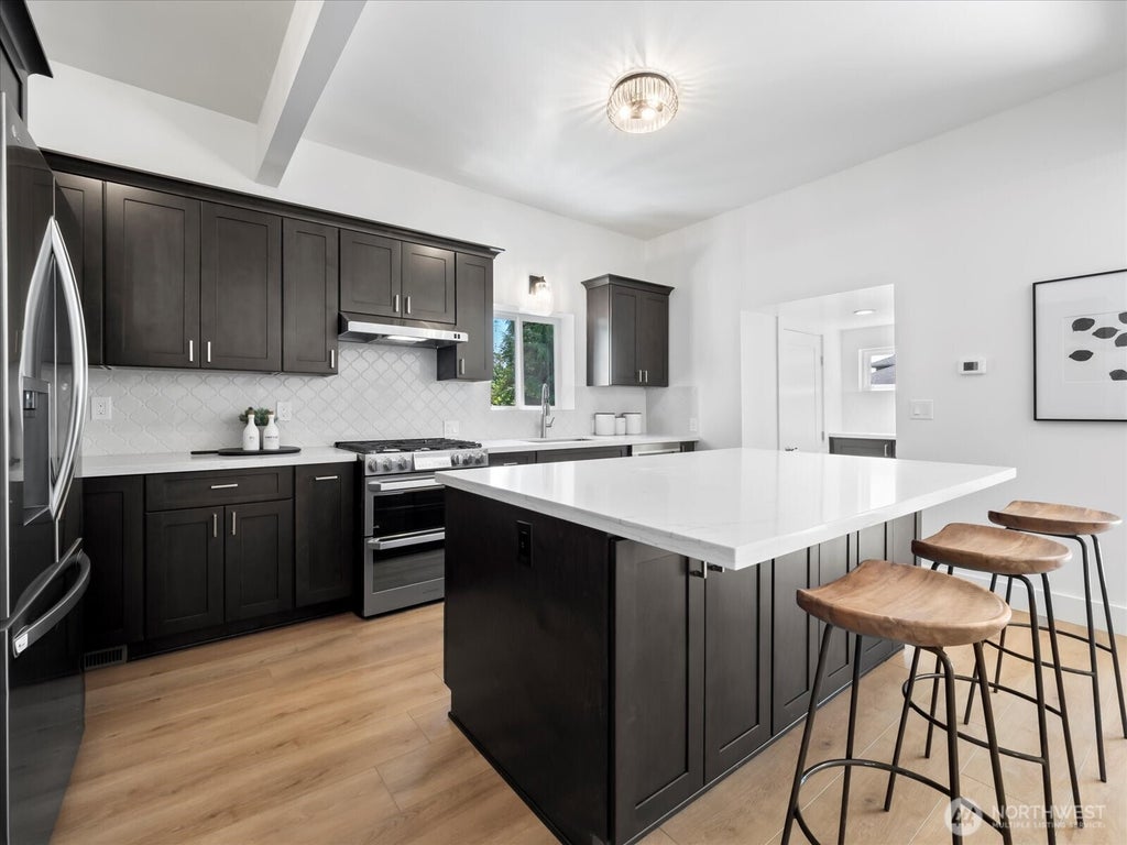 Photo of 3117 E Yesler Way, Seattle, WA 98122 (MLS # 2581756)