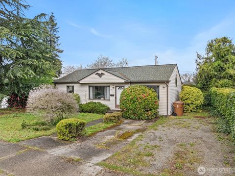 Photo of 919 E 59th Street, Tacoma, WA 98404 (MLS # 2509121)