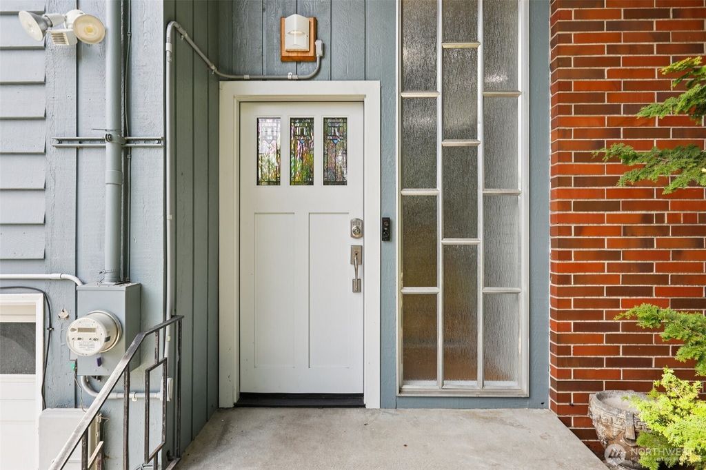 Photo of 9009 30th Avenue NW, Seattle, WA 98117 (MLS # 2499924)