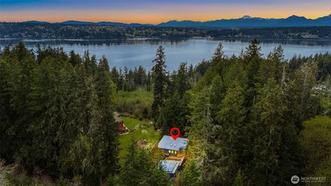 Photo of 10143 Battle Point Drive NE, Bainbridge Island, WA 98110 (MLS # 2530661)