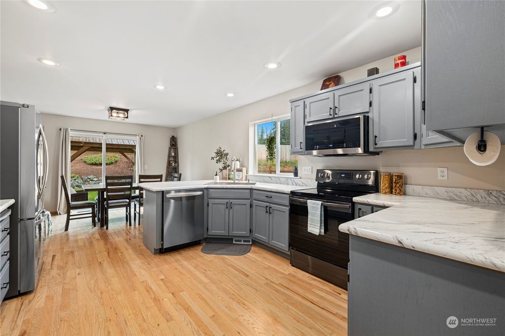 Photo of 815 Darwins Way, Granite Falls, WA 98252 (MLS # 2243868)