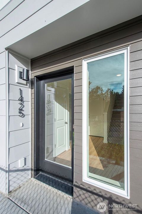 Photo of 1425 SW 111th Lane, Seattle, WA 98164 (MLS # 2497283)