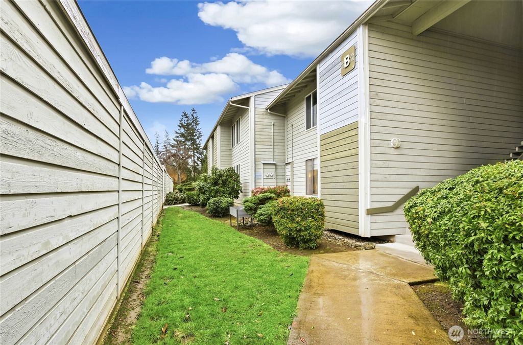 Photo of 14401 SE Petrovitsky Road #B102, Renton, WA 98058 (MLS # 2485726)