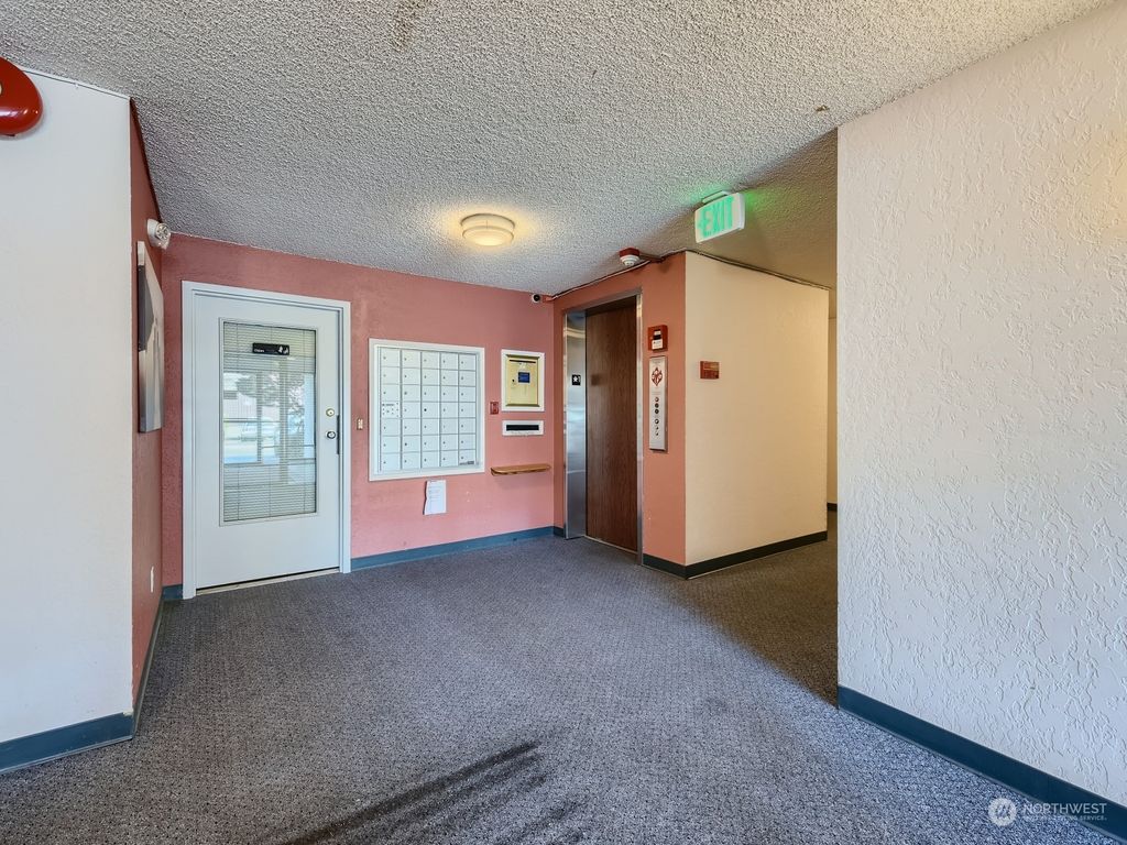 Photo of 12300 28th Avenue NE #305, Seattle, WA 98125 (MLS # 2202717)