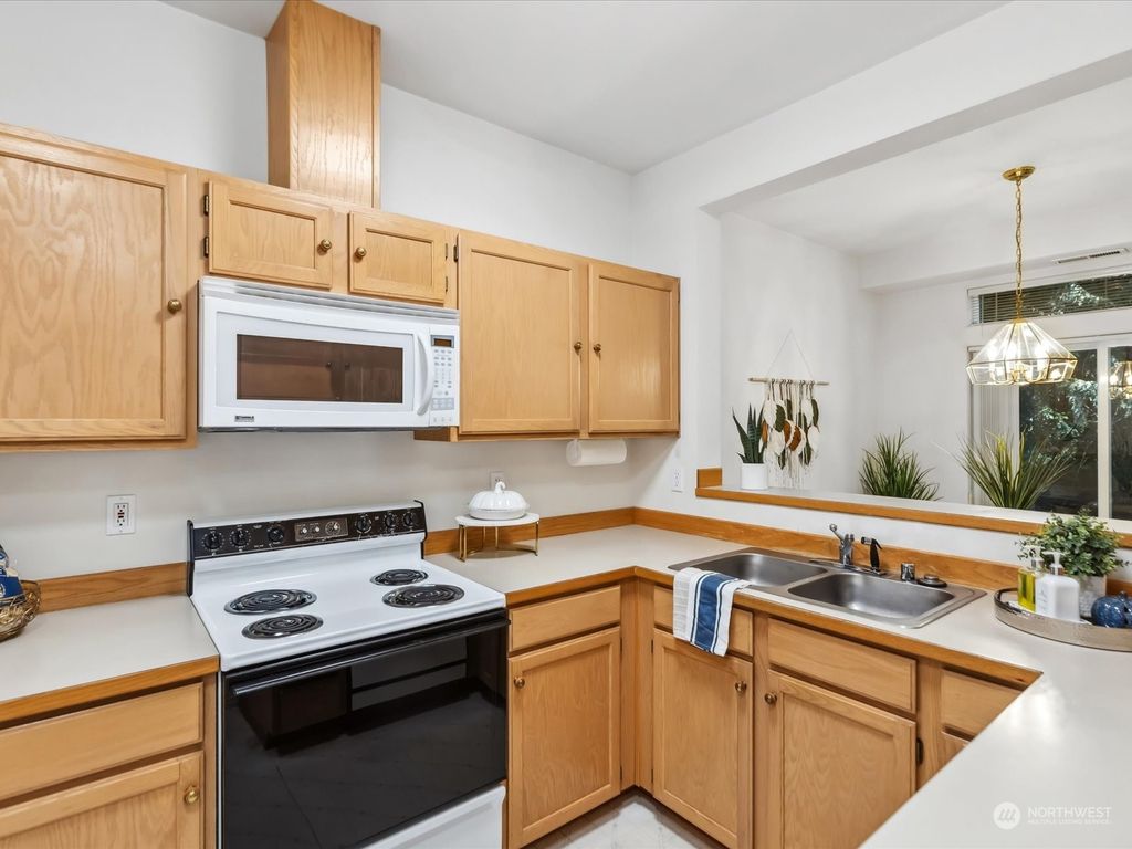 Photo of 5107 176th Street SW #E, Lynnwood, WA 98037 (MLS # 2310368)
