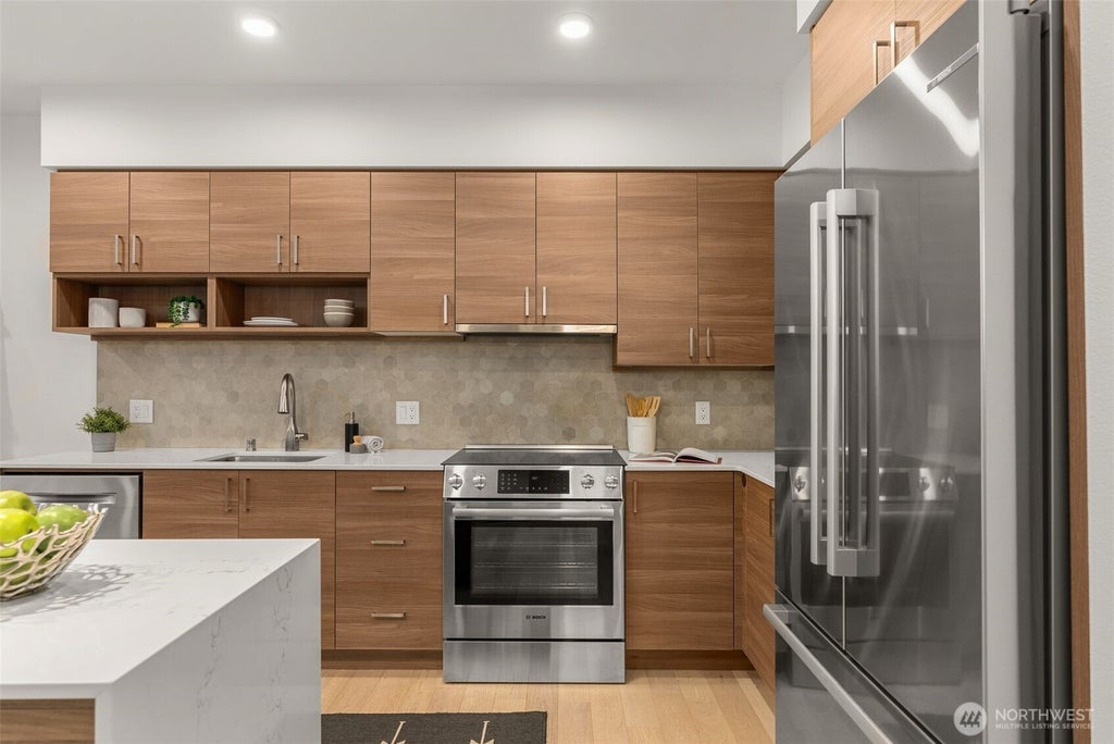 Photo of 11903 NE 128th Street #216, Kirkland, WA 98034 (MLS # 2534652)