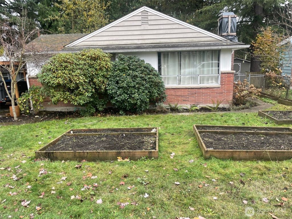 Photo of 3701 SW 105th Street, Seattle, WA 98146 (MLS # 2455472)