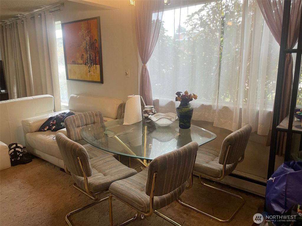 Photo of 3701 SW 105th Street, Seattle, WA 98146 (MLS # 2455472)