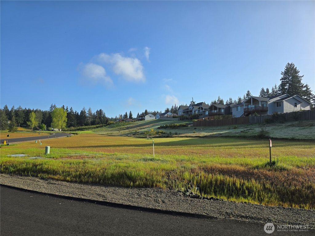 Photo of 30 E Virgil Drive W, Allyn, WA 98524 (MLS # 2513697)