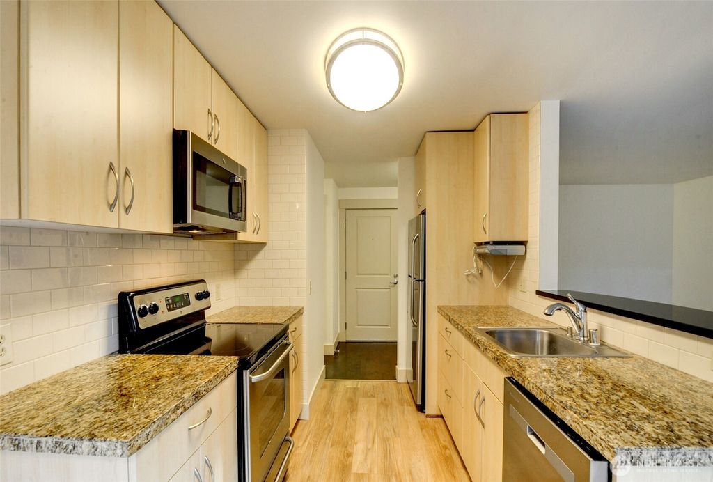 Photo of 23015 Edmonds Way #A103, Edmonds, WA 98020 (MLS # 2412859)