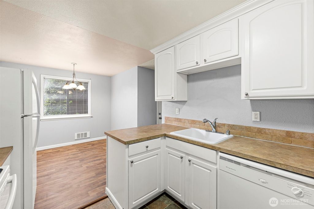 Photo of 10010 Golden Given Road E #4, Tacoma, WA 98445 (MLS # 2515698)