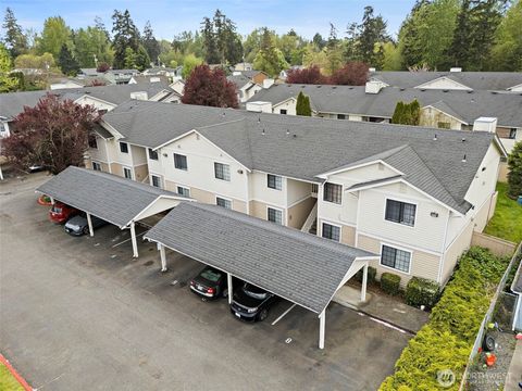 Photo of 10010 Golden Given Road E #4, Tacoma, WA 98445 (MLS # 2515698)