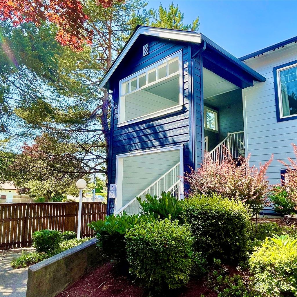 Photo of 10825 SE 200th Street #A101, Kent, WA 98031 (MLS # 2132683)