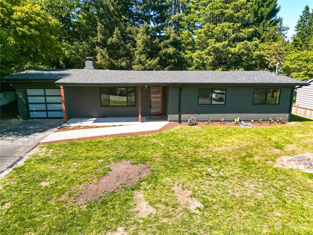Photo of 3018 NE 203rd Street, Lake Forest Park, WA 98155 (MLS # 2073871)