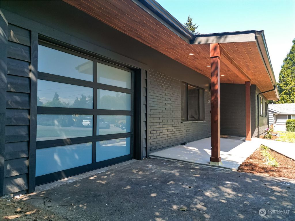 Photo of 3018 NE 203rd Street, Lake Forest Park, WA 98155 (MLS # 2073871)