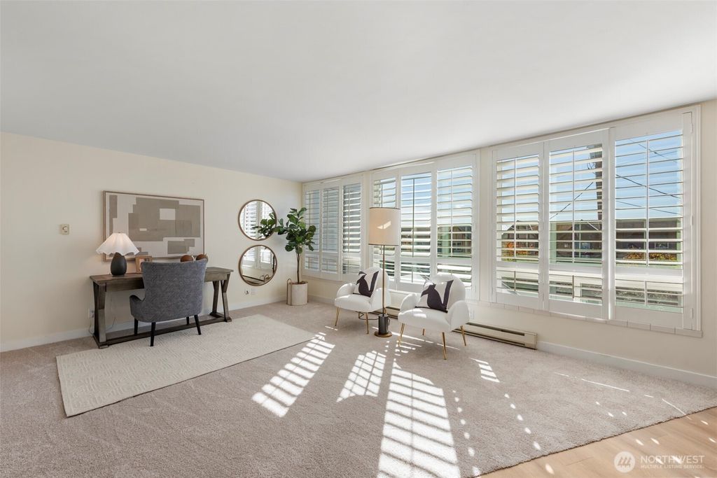 Photo of 500 W Olympic Place #203, Seattle, WA 98119 (MLS # 2496910)