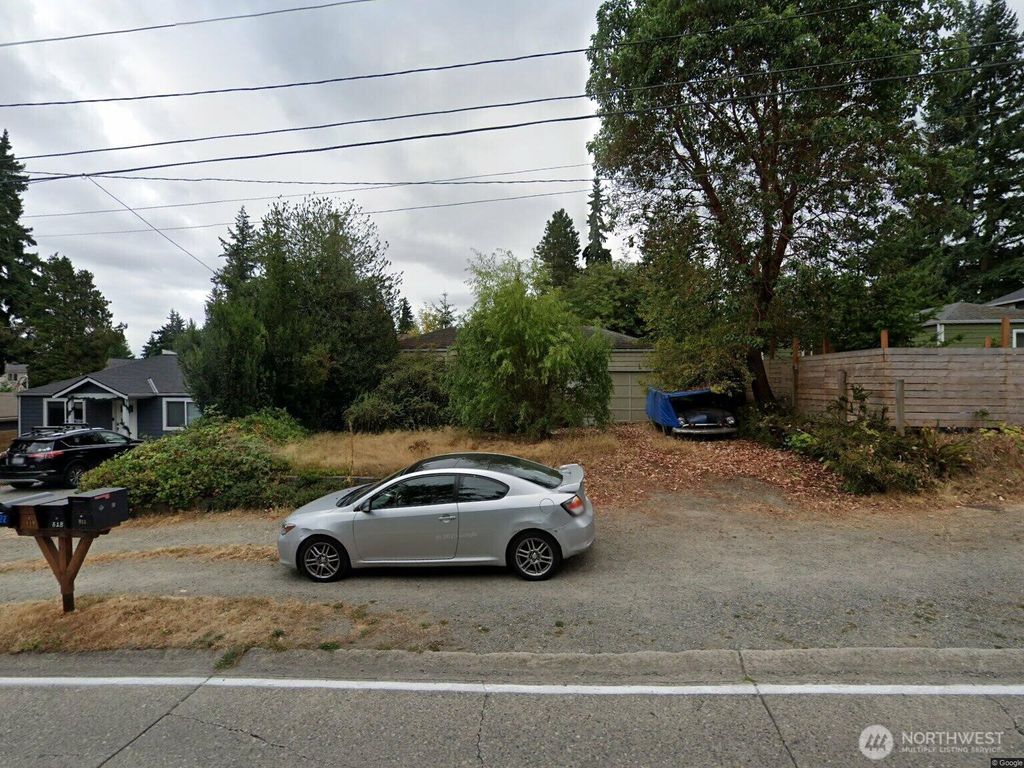 Photo of 813 NE 125th Street, Seattle, WA 98125 (MLS # 2394532)
