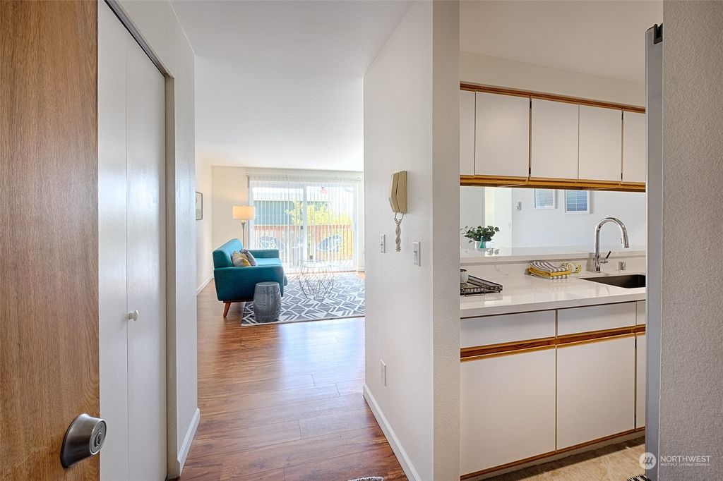 Photo of 7000 Cleopatra Place NW #301, Seattle, WA 98117 (MLS # 2217672)