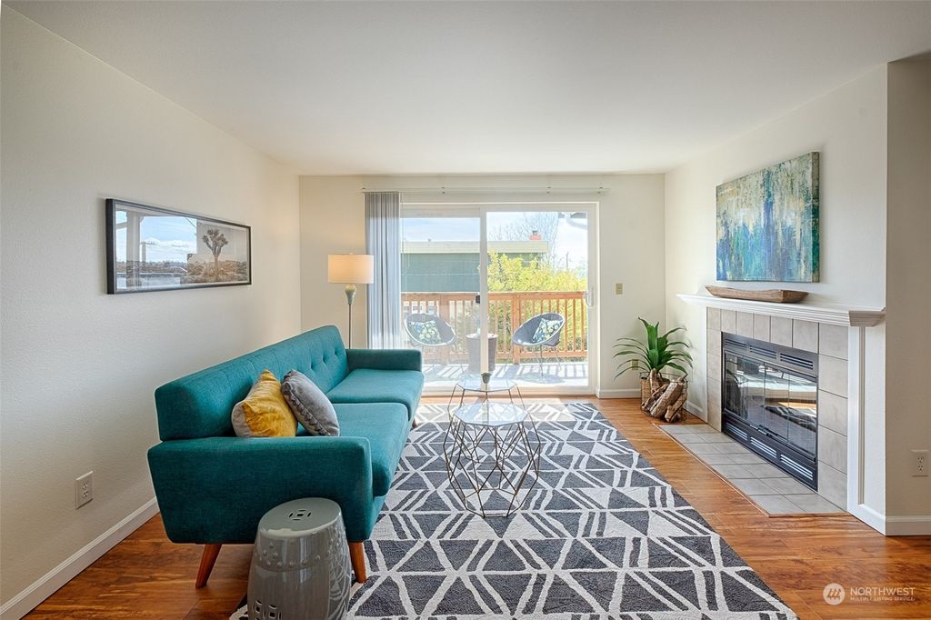 Photo of 7000 Cleopatra Place NW #301, Seattle, WA 98117 (MLS # 2217672)
