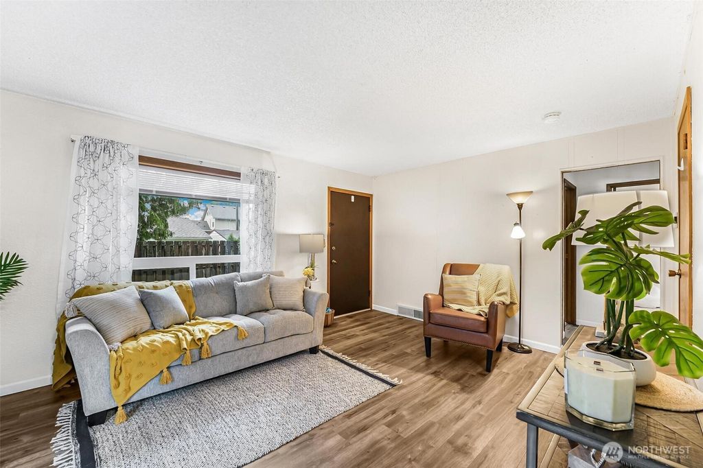 Photo of 12642 74th Ave Ave S, Seattle, WA 98178 (MLS # 2455013)