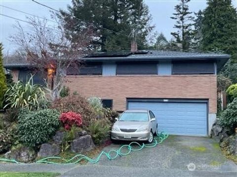 Photo of 7704 46th Avenue SW, Seattle, WA 98136 (MLS # 2528809)