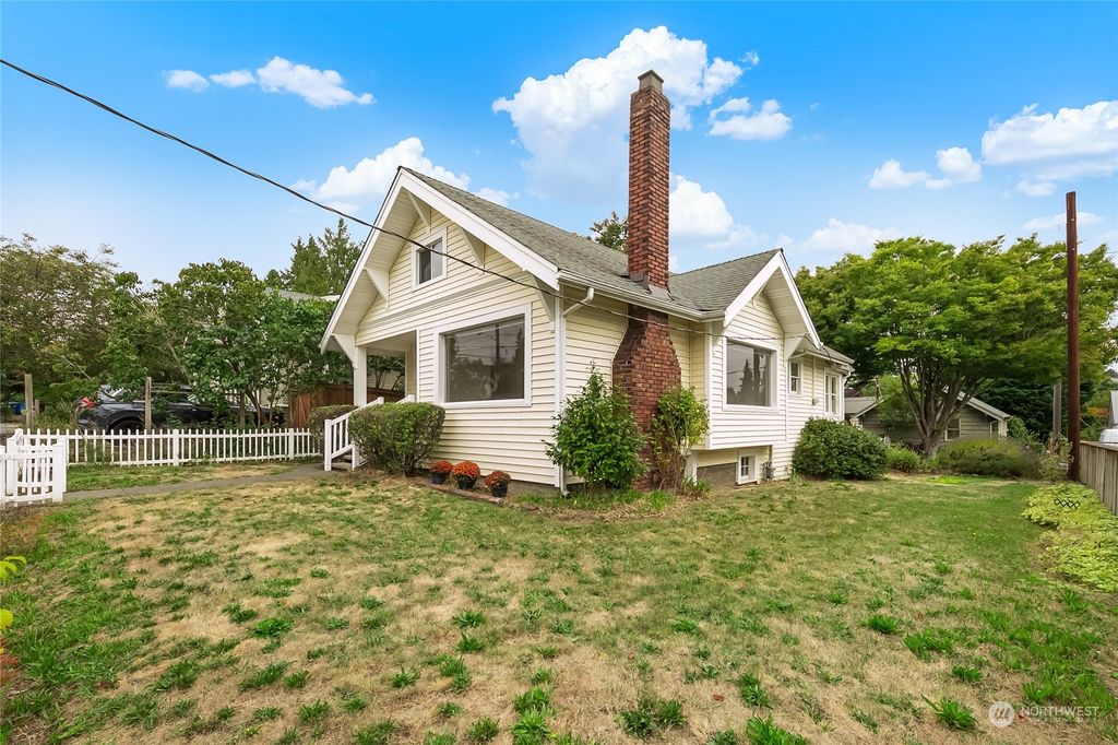 Photo of 6552 Division Avenue NW, Seattle, WA 98117 (MLS # 2289272)