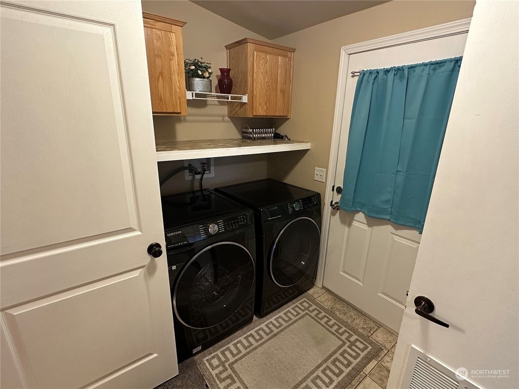 Photo of 11436 SE 208th Street #49, Kent, WA 98031 (MLS # 2043736)