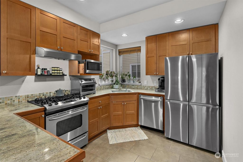 Photo of 6990 23rd Avenue SW, Seattle, WA 98106 (MLS # 2163121)