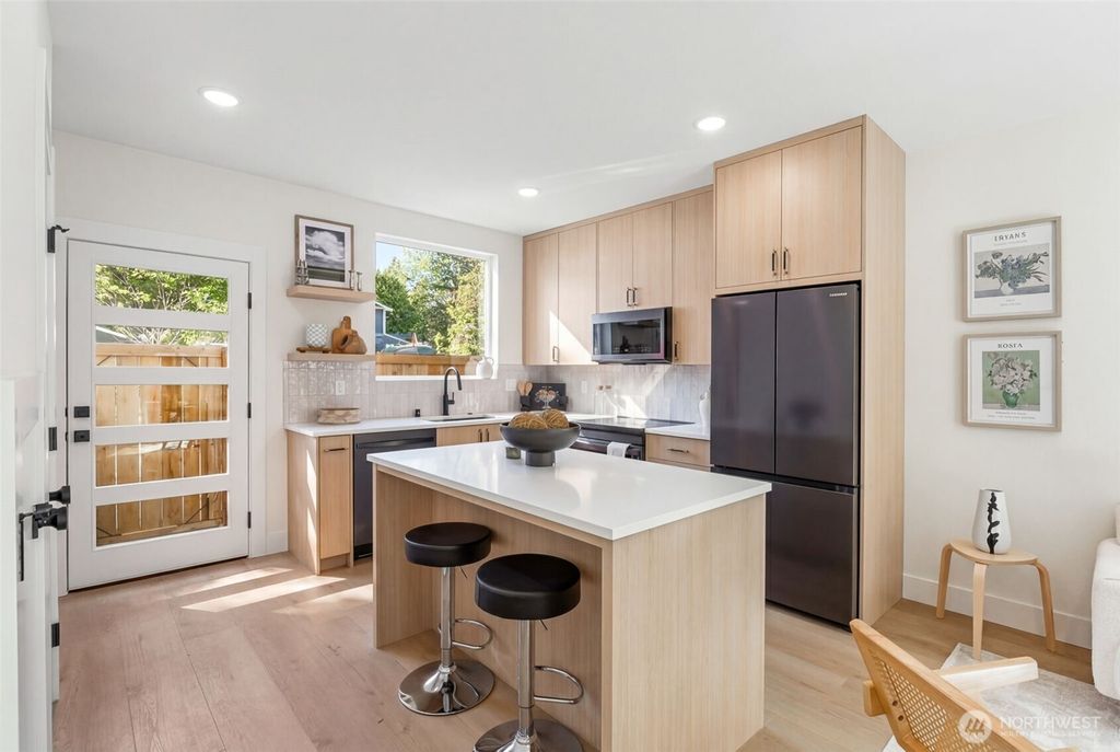 Photo of 11013 Goodwin Way NE, Seattle, WA 98125 (MLS # 2504435)