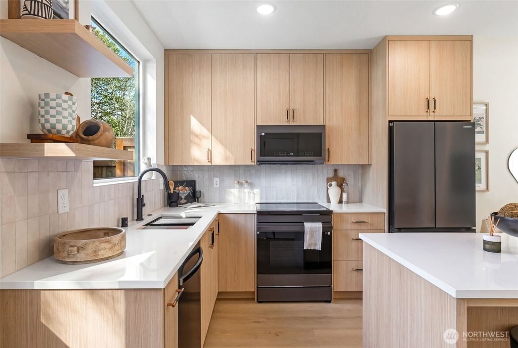 Photo of 11013 Goodwin Way NE, Seattle, WA 98125 (MLS # 2504435)